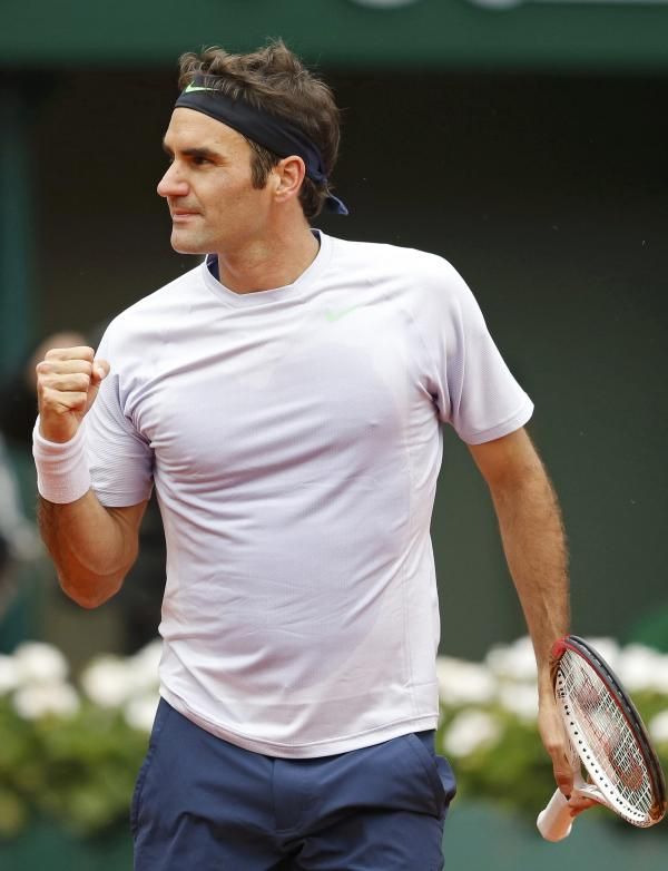 2013-05-31t140050z_273368620_sr1e95v12wn7n_rtrmadp_3_tennis-open-federer_reuters