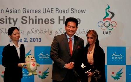 song young-gil hands over certificate of appointment to he sheikha latifah bint ahmed bin juma al maktoum as goodwill ambassador for 17th asian games
