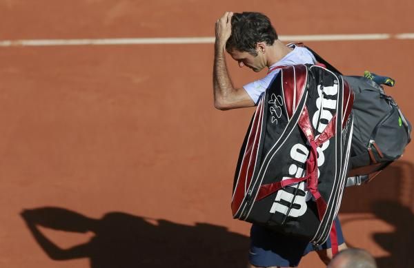 2013-06-04t165242z_151946361_sr1e9641av2r8_rtrmadp_3_tennis-open-federer_reuters