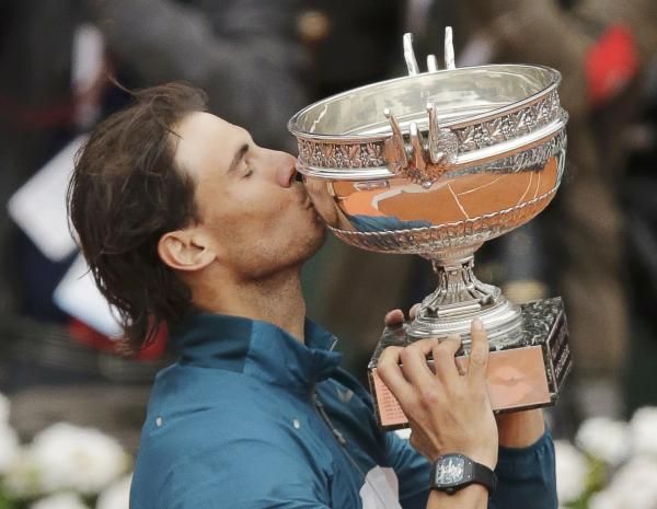 2013-06-09t165515z_1897654290_sr1e9691azk6r_rtrmadp_3_tennis-open_reuters