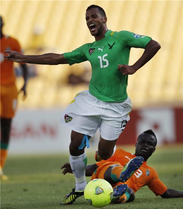 الكسيس روماو لاعب منتخب توجو بالقميص الأخضر