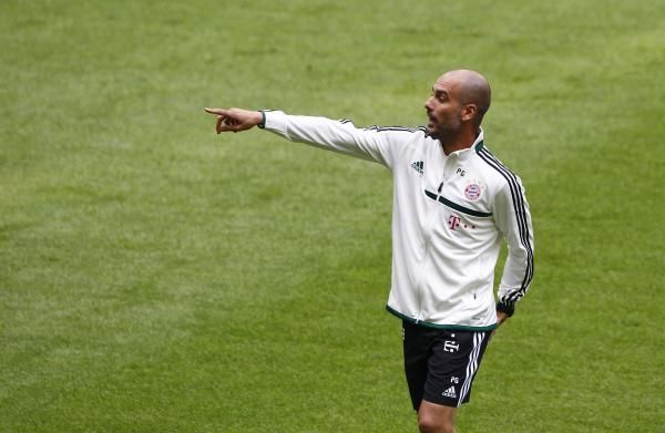 2013-06-26t153530z_199994797_lr2e96q17avx7_rtrmadp_3_soccer-bayern-guardiola_reuters
