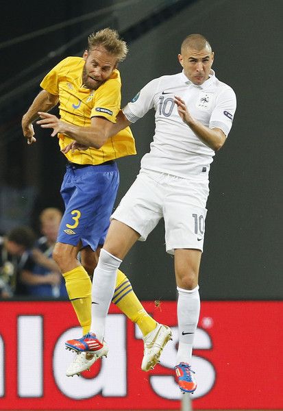  اولوف ميلبرج (يسار)