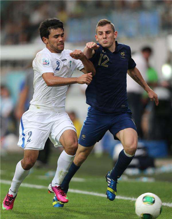 لوكا ديني (يمين)