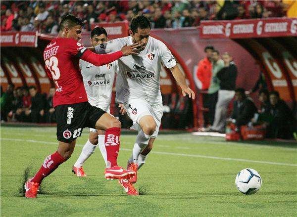 لقطة من مباراة أطلس مع تيخوانا