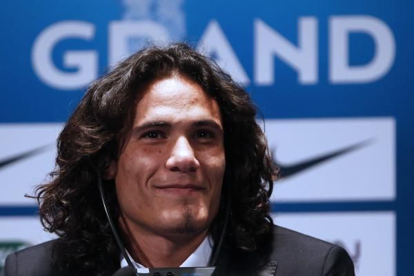 2013-07-16t172737z_867488866_pm1e97g1hyq01_rtrmadp_3_soccer-france-psg-cavani_reuters