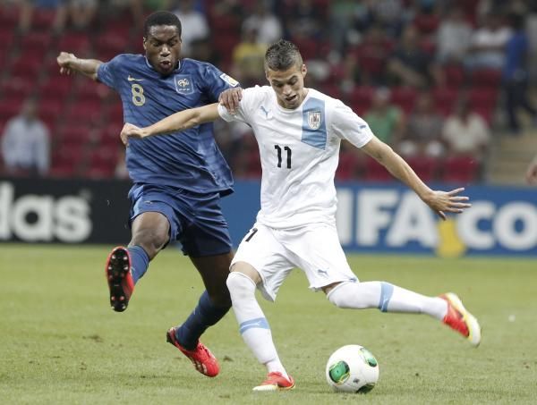 جيفري كوندوجبيا (يسار)