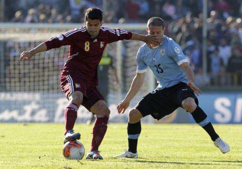 توماس رينكون "إلى اليسار" 