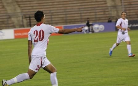 بهاء أبو سيف فرحا بإحرازه هدفي لمنتخب الأردن 