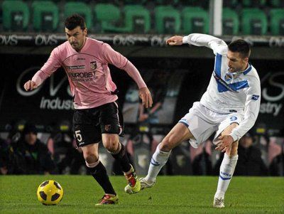 تشيزاري بوفو (يسار )