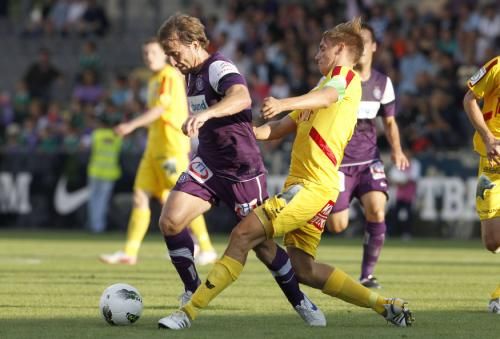 دومينيك تابوجا (يمين)