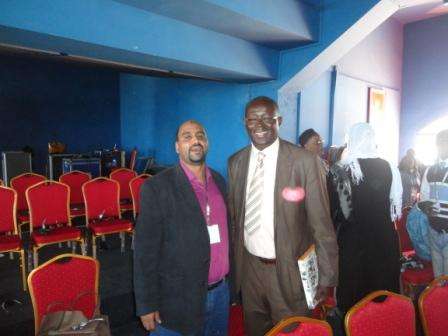 رئيس الإتحاد السنغالي لكرة القدم ((يمين))