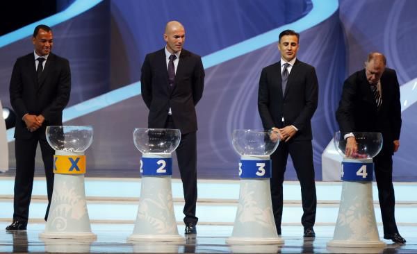 2013-12-06t174205z_2031410166_tb3e9c61d5w6w_rtrmadp_3_soccer-world-draw_reuters