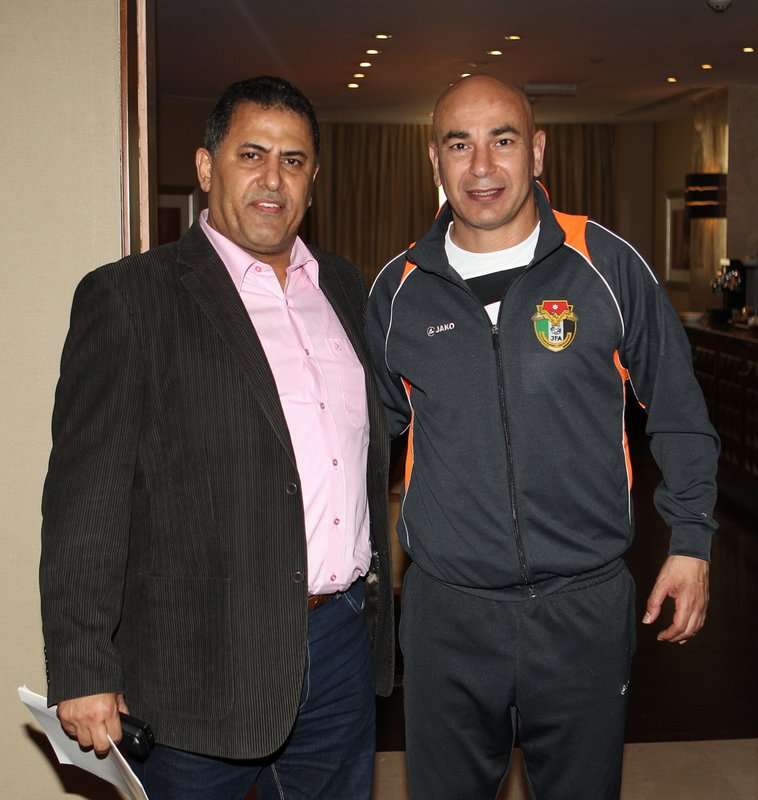 حسام حسن مع رئيس تحرير كووورة 