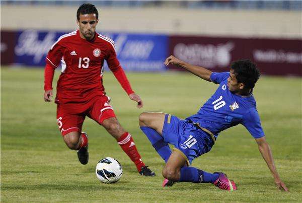 دانجدا بالزي الأرزق مع منتخب بلاده 