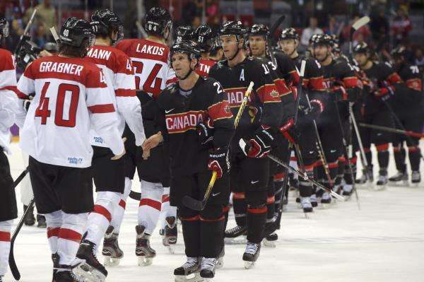 2014-02-14t192826z_97431832_lr2ea2e1i33ep_rtrmadp_3_olympics-icehockey_reuters