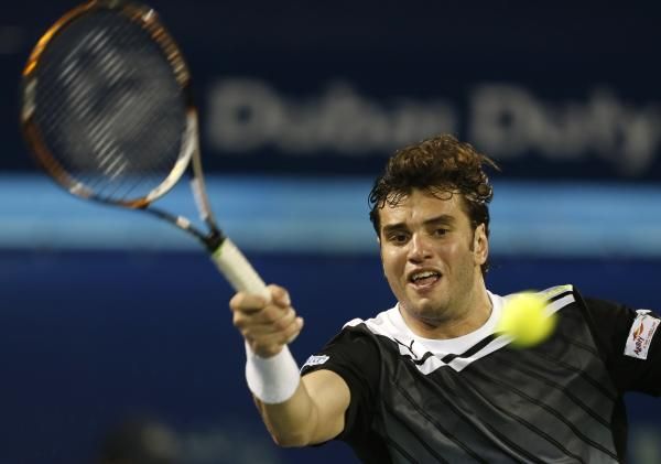 2013-02-25t163934z_638957884_gm1e92q01sa01_rtrmadp_3_tennis-men-dubai_reuters