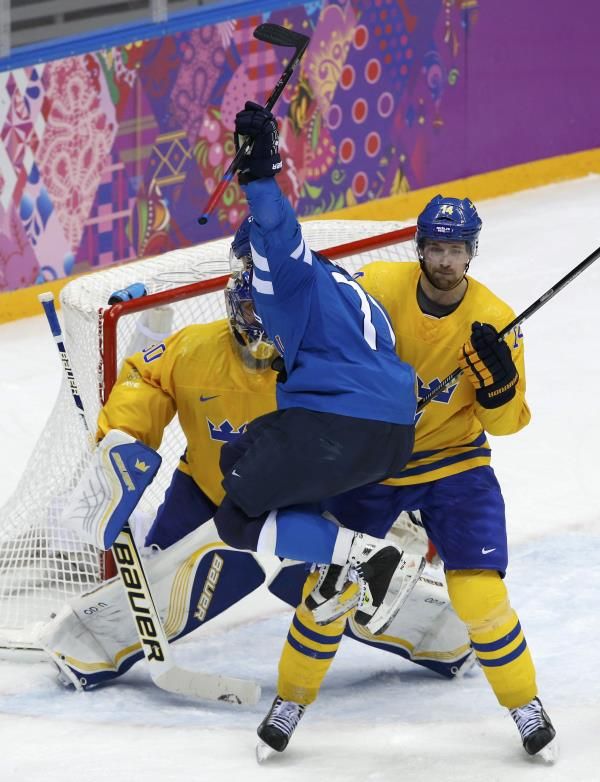 2014-02-21t144333z_949948523_lr2ea2l14wbzy_rtrmadp_3_olympics-icehockey_reuters