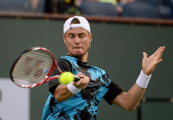 2014-03-07t022502z_146927905_nocid_rtrmadp_3_tennis-bnp-paribas-open-hewitt-v-ebden_reuters