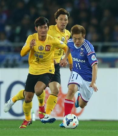 من لقاء فريقي يوكوهاما الياباني وجوانجزو الصيني بالجولة السابقة