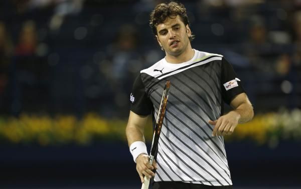 2013-02-25t164306z_1829801297_gm1e92q01xn01_rtrmadp_3_tennis-men-dubai_reuters