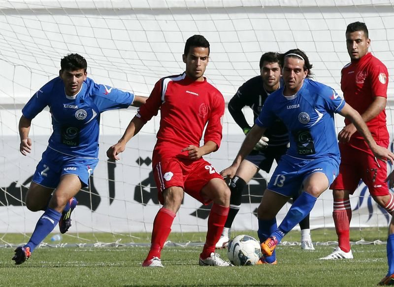 لقطة من مباراة الرمثا والشيخ حسين