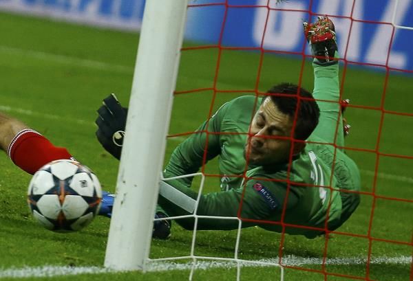 2014-03-11t214050z_369442019_lr1ea3b1o7ra9_rtrmadp_3_soccer-champions_reuters