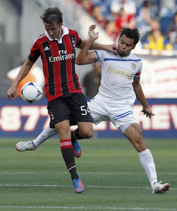  بريان كريستانتي (يسار)