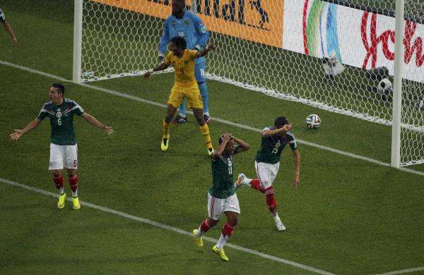 2014-06-13t184758z_1752978669_tb3ea6d1iukd6_rtrmadp_3_soccer-world-m02-mex-cmr_reuters