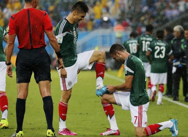2014-06-13t174009z_2014610140_tb3ea6d1fp79v_rtrmadp_3_soccer-world-m02-mex-cmr_reuters