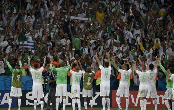 1403470827328_lc_galleryImage_Algeria_s_players_celebra