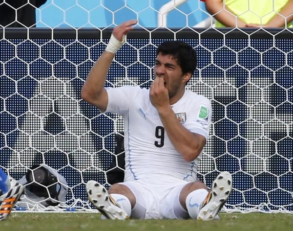 2014-06-25t052940z_256866167_gm1ea6p11ep01_rtrmadp_3_soccer-world-uruguay-suarez_reuters