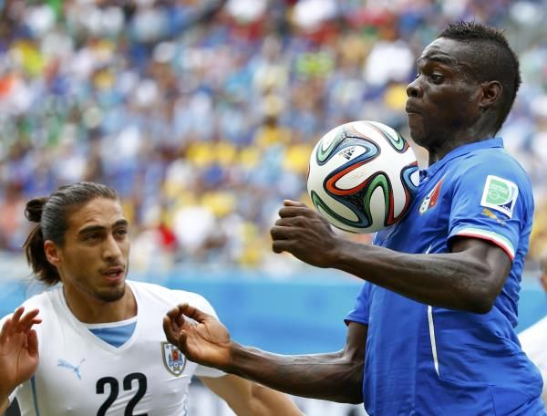 2014-06-24t162043z_1896041369_tb3ea6o1c2033_rtrmadp_3_soccer-world-m39-ita-uru_reuters