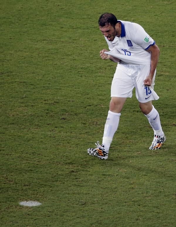 2014-06-19t224918z_1315393377_tb3ea6j1u139r_rtrmadp_3_soccer-world-m22-jpn-gre_reuters