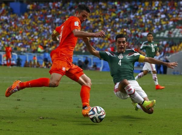 2014-06-29t173304z_1437802255_tb3ea6t1femar_rtrmadp_3_soccer-world-m51-ned-mex_reuters