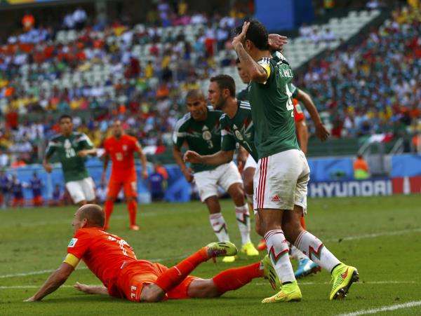 2014-06-29t184425z_1941687386_gf2ea6t1fih01_rtrmadp_3_soccer-world-m51-ned-mex_reuters