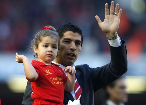 2014-07-11t121455z_1734229564_gm1ea7b1k3m01_rtrmadp_3_soccer-spain-barcelona-suarez_reuters