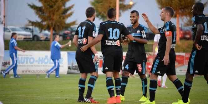 فرحة لاعب مارسيليا ديميتري بايت (10) بالهدف الرابع امام ليفركوزن