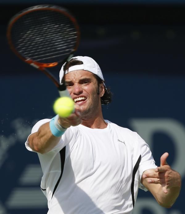 2014-02-26t121450z_316636685_gm1ea2q1k6501_rtrmadp_3_tennis-men-dubai_reuters