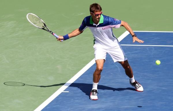 2014-08-14t222447z_880157750_nocid_rtrmadp_3_tennis-western-and-southern-open-djokovic-vs-robredo_reuters