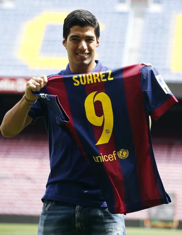 2014-08-19t112904z_337394465_gm1ea8j1hk401_rtrmadp_3_soccer-spain-suarez_reuters