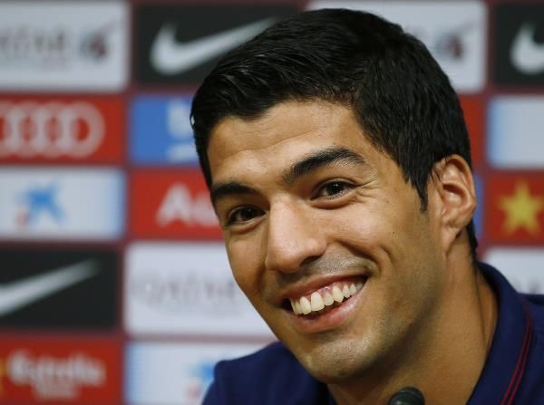 2014-08-19t120710z_141560460_gm1ea8j1joe01_rtrmadp_3_soccer-spain-suarez_reuters