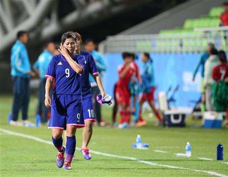 لاعبات منتخب اليابان بعد تعادلهن مع الصين من دون أهداف