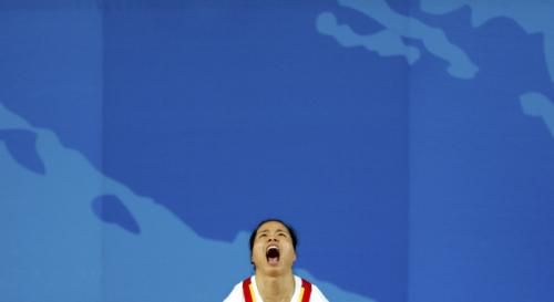 2008-08-11t083207z_01_olyrus154_rtrnsrp_0_olympics-weightlifting-_reuters