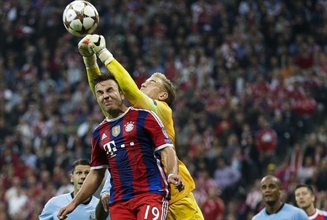 1411000230105_Image_galleryImage_Bayern_s_Mario_Goetze_lef