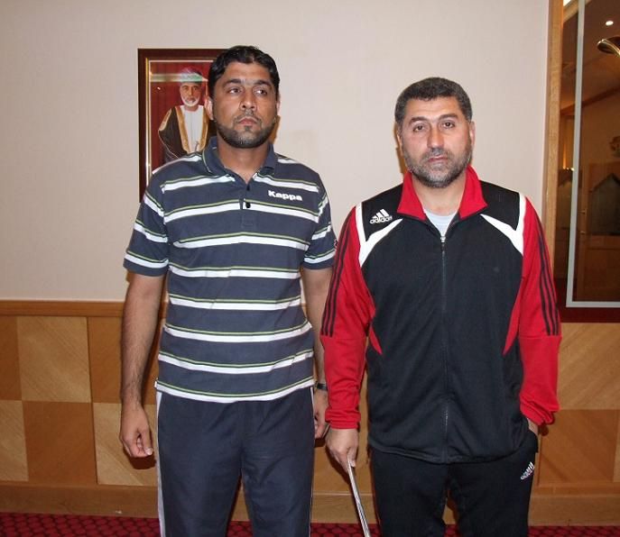 نزار محروس (شبابي الاردن) وحمد خليفة (النهضة العماني) وبعدسة كووورة