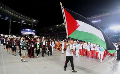 أحمد ماهر يرفع علم فلسطين في الآسياد   