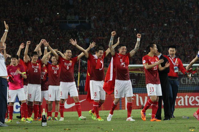 hi-res-187465524-players-of-guangzhou-evergrande-celebrate-after-winning_crop_exact