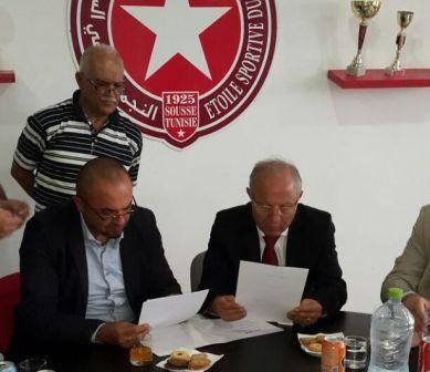 عباس ورضا شرف الدين خلال توقيع الإتفاقية