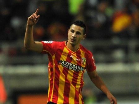 يووان توزجار